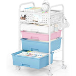 SYKIARIOL rolling storage cart with pegboard top, pastel pink and blue drawers with an alarm clock and headphones on top