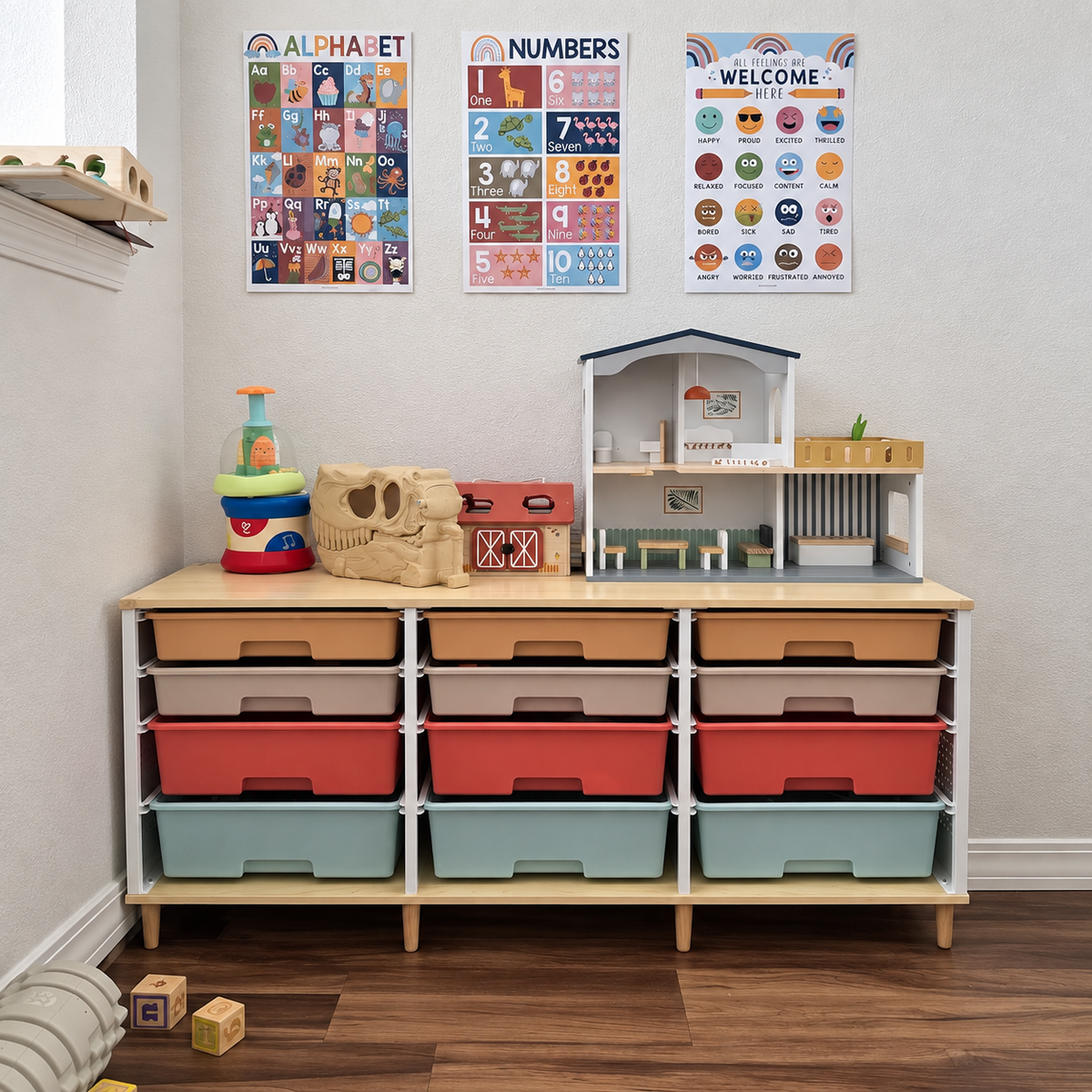Wood-top rolling drawer cabinet with colorful drawers in a kids room under wall posters