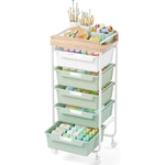 SYKIARIOL rolling storage cart with drawers, six-drawer version with sage green drawers holding paint pots