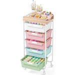 SYKIARIOL rolling storage cart with drawers, six-drawer version with pink, mint and green drawers holding paint tubes