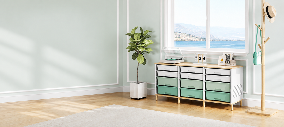 SYKIARIOL white and mint green drawer cabinet in a bright room with a window and a wooden coat stand