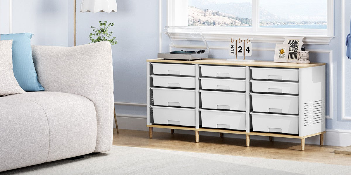 White drawer storage cabinet beside a sofa in a living room with a window view